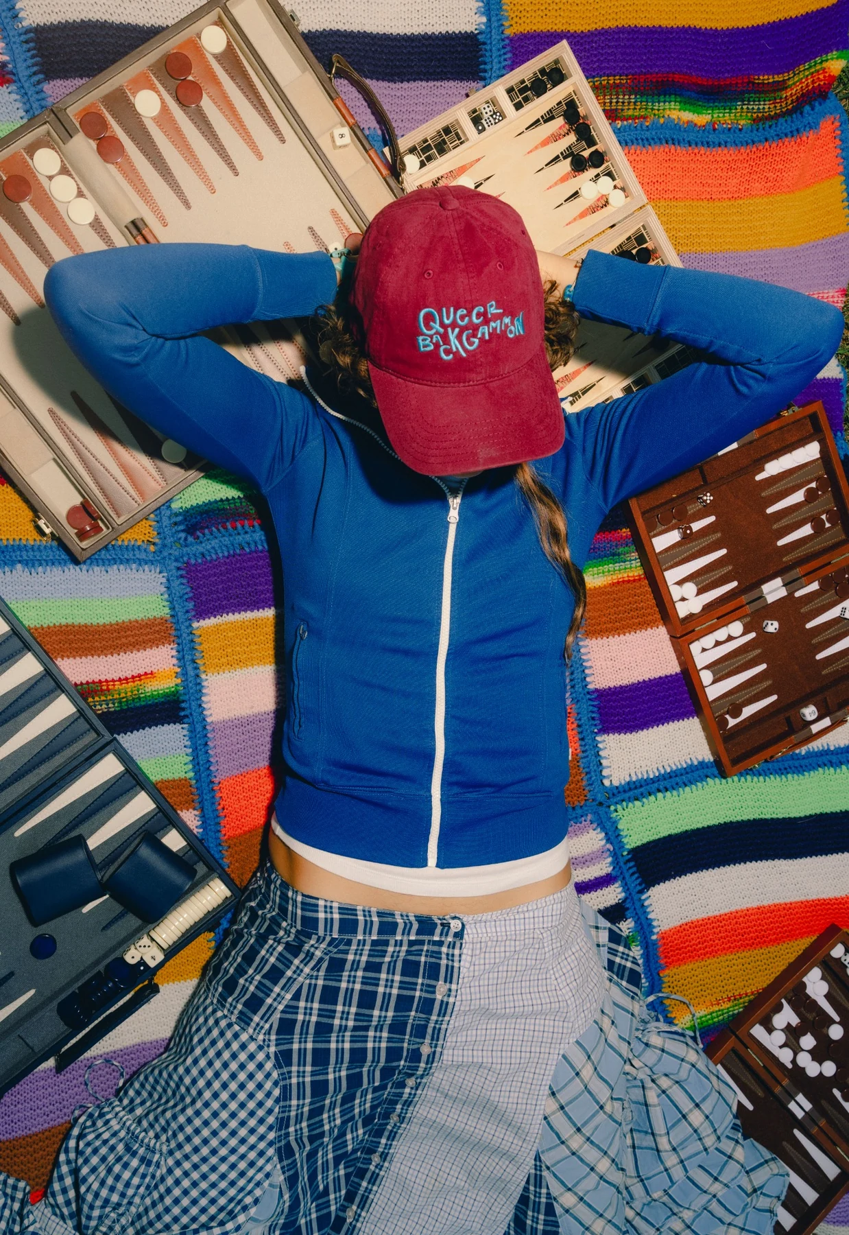 chosen family hat among backgammon boards